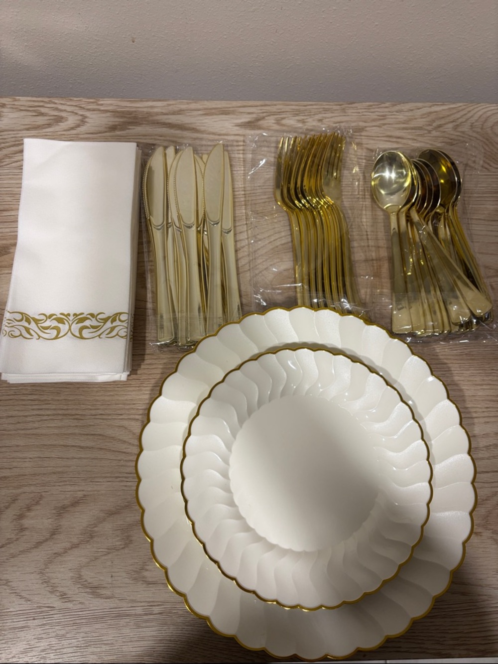 Elegant White and Gold Scalloped Paper Plates with Matching Cutlery and Napkins